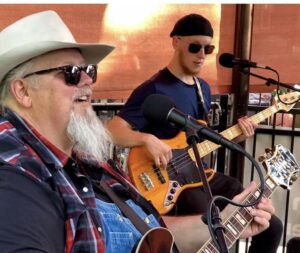 Mississippi Marshall performing with his 18-year-old grandson, Grayson.